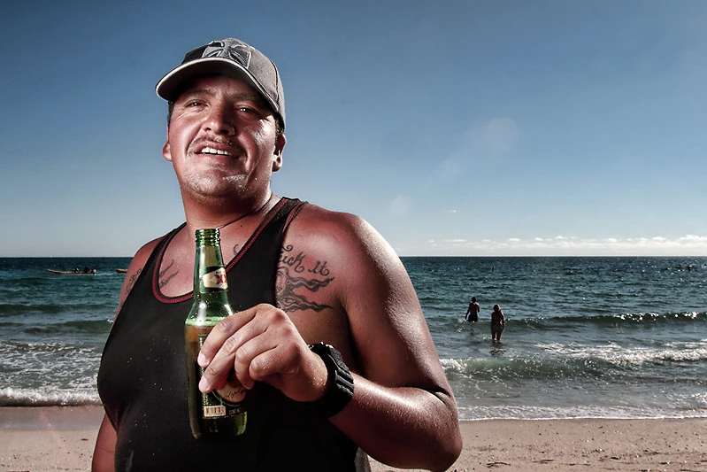 Don Giannatti photographs, chill guy on the beach side