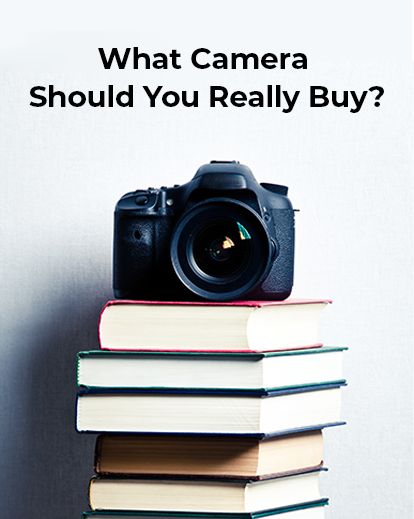 image of a camera placed over a pile of books
