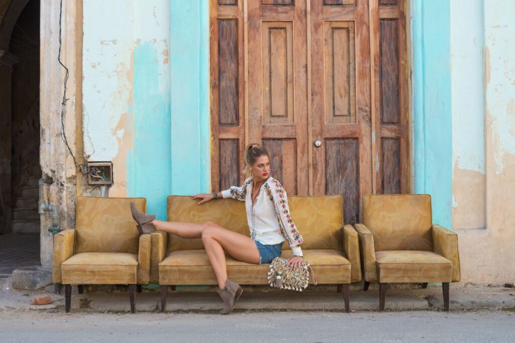 girl sitting on a vintage sofa