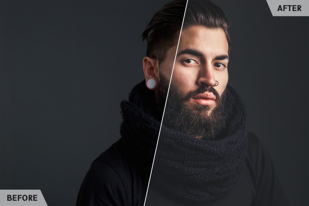Close up portrait of a cool guy with beard and piercings