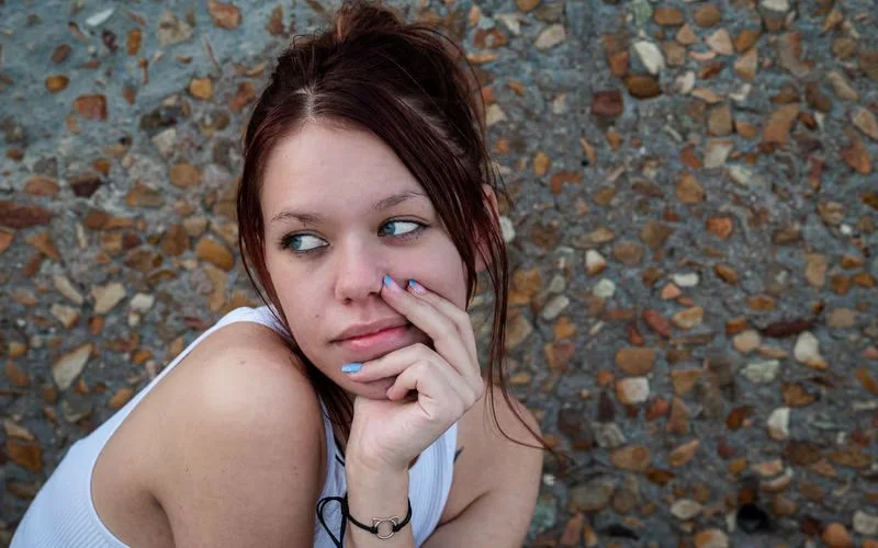 model With Hair Covering Face Pose