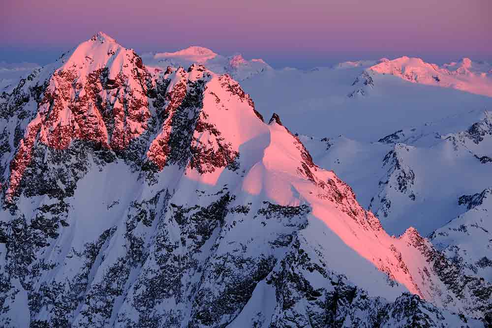 sunset on the snow clad mountains