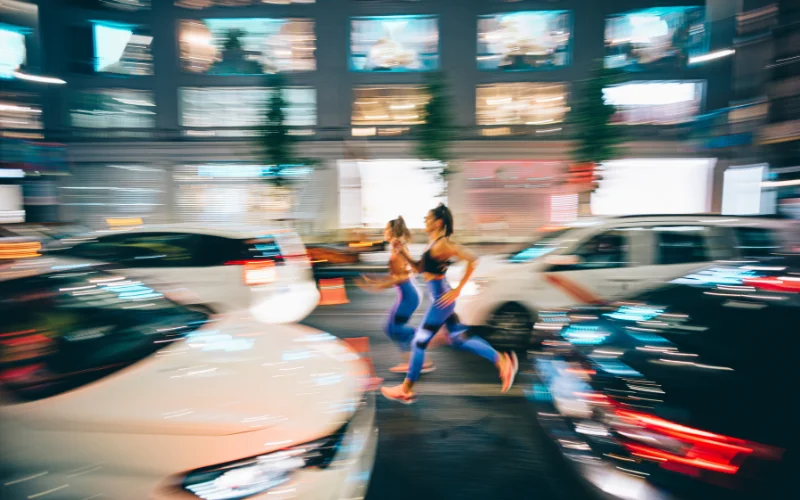 Street Photography, image showing a busy city at night, motion photography ideas