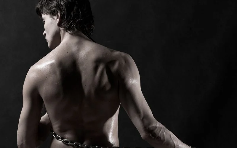 backside male nude pose