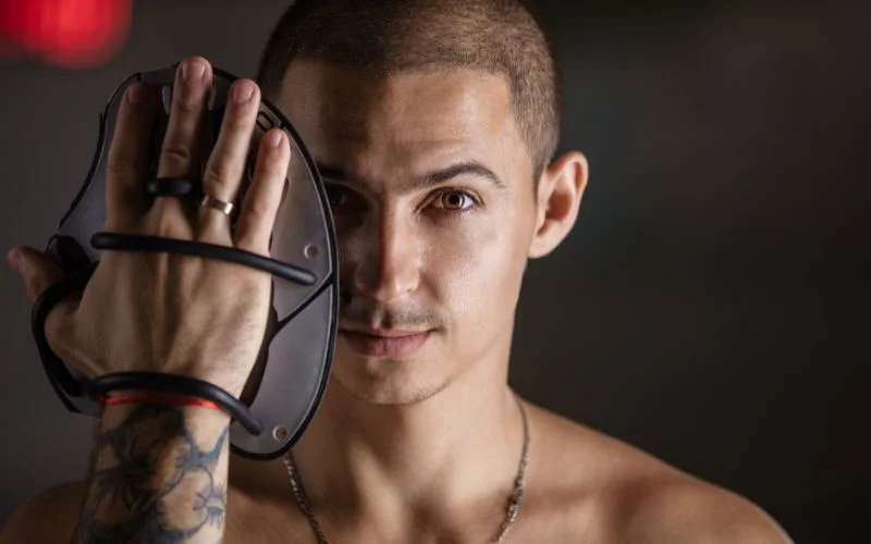 male nude pose with prop