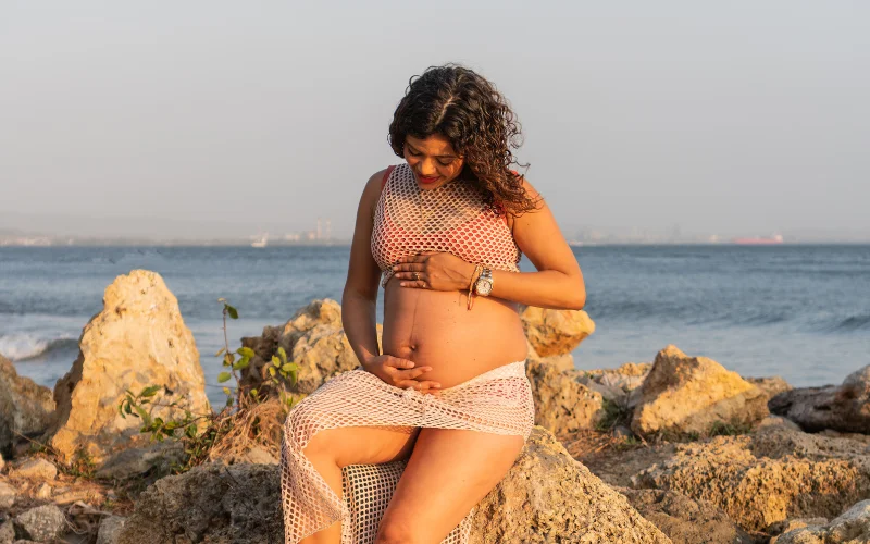 Nude maternity shoot in nature