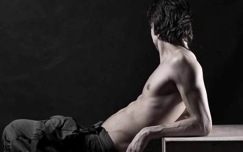 reclining male nude pose