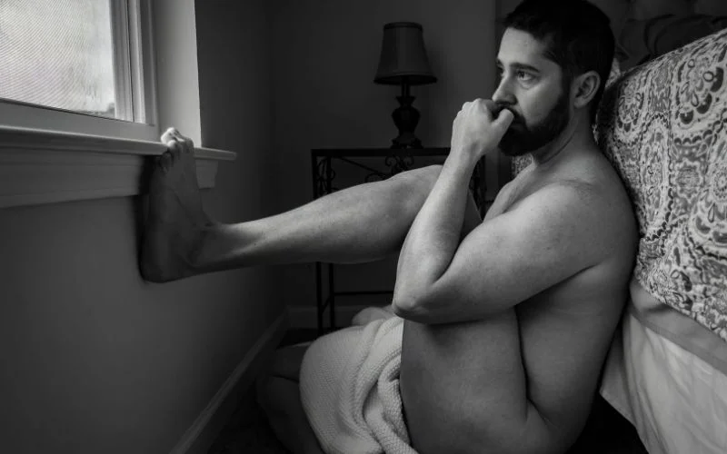 side view male nude pose