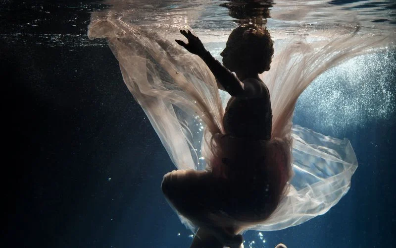 silhouette underwater nude photography