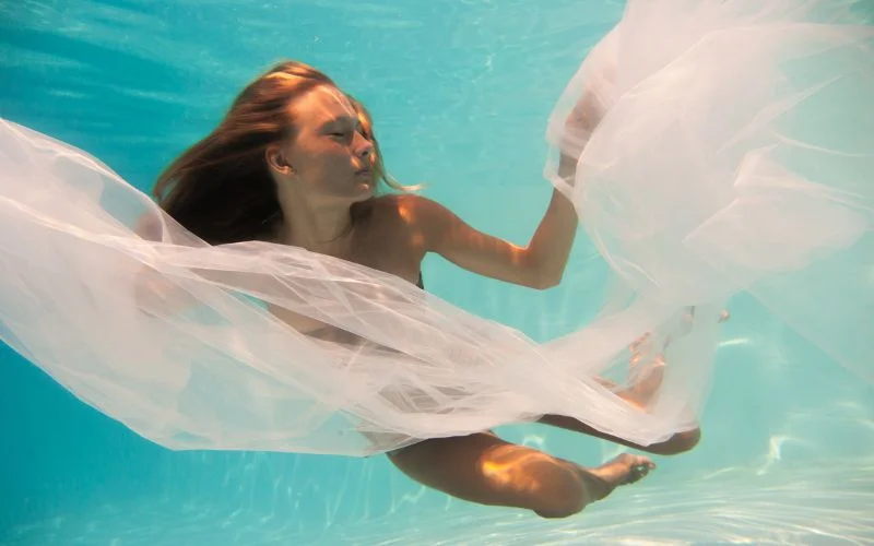 floating goddess elegant underwater pose