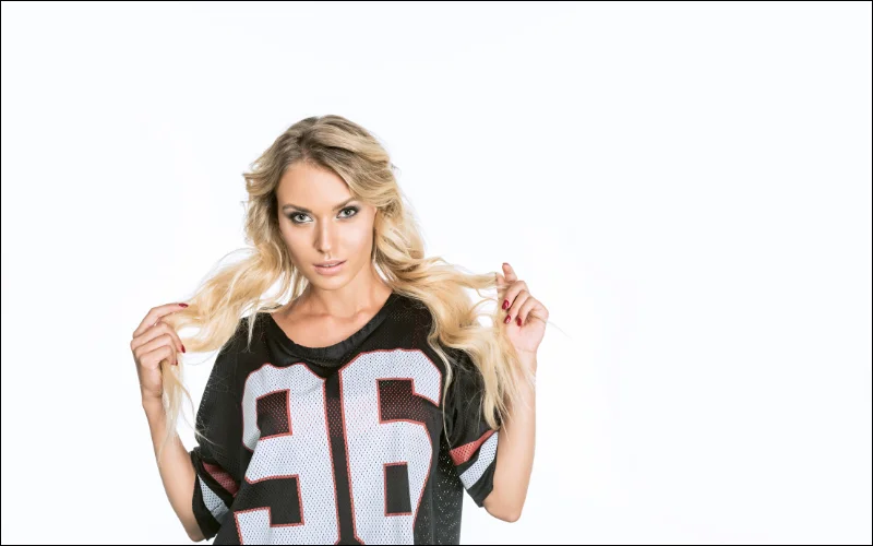 boudoir photography outfit ideas - woman in a sports jersey