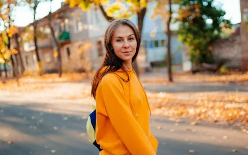 woman wearing orange dress