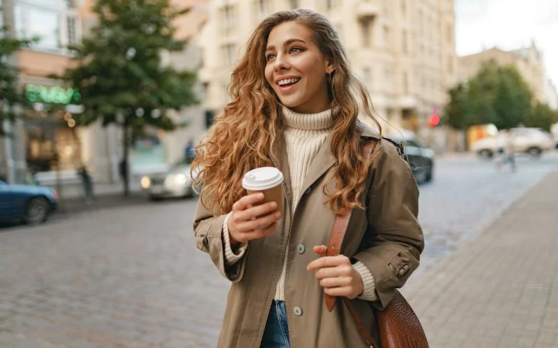 portrait of a girl holding coffee