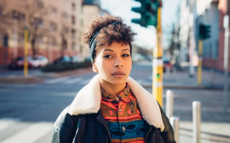 street portrait photography of a woman wearing headband