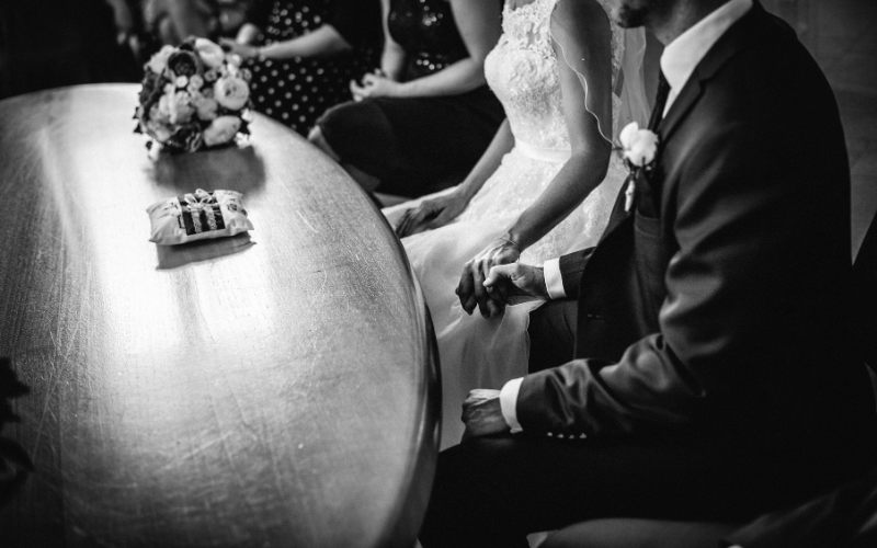 couple having a bouquet in their hands