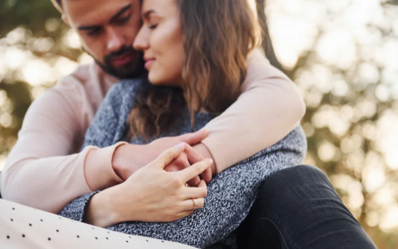 happy couple on bed shoot idea