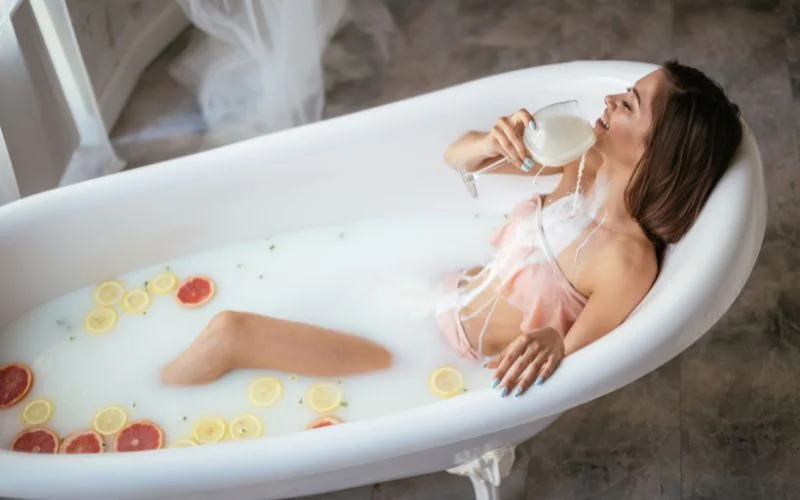 bathtub nude with props