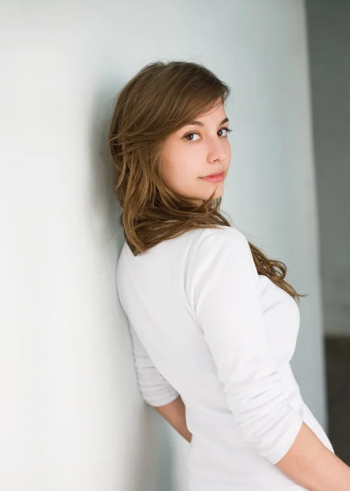 Looking back over the shoulder headshot pose