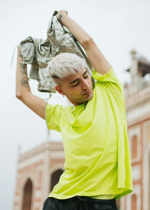 a man with his hands in the air