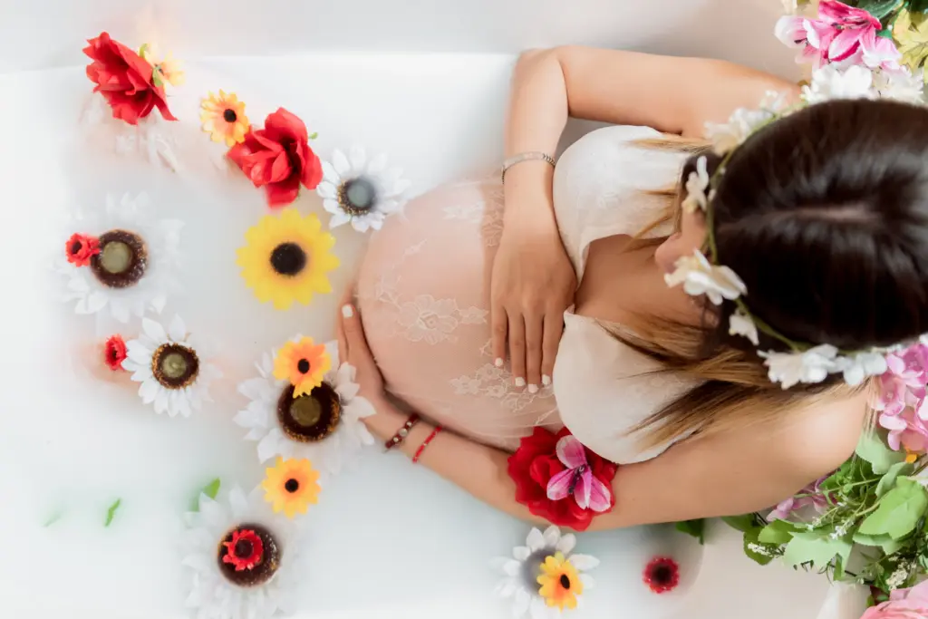 pregnant women in decorated tub