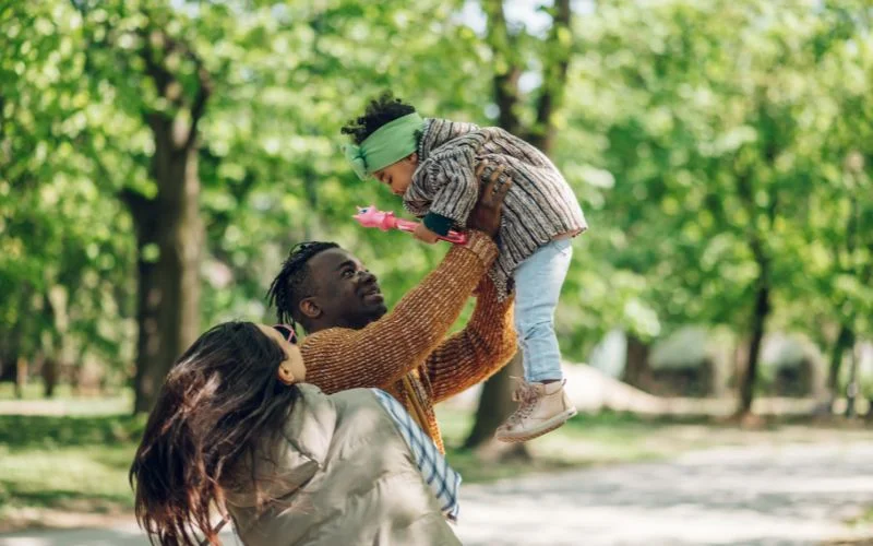 airplane ride pose with baby