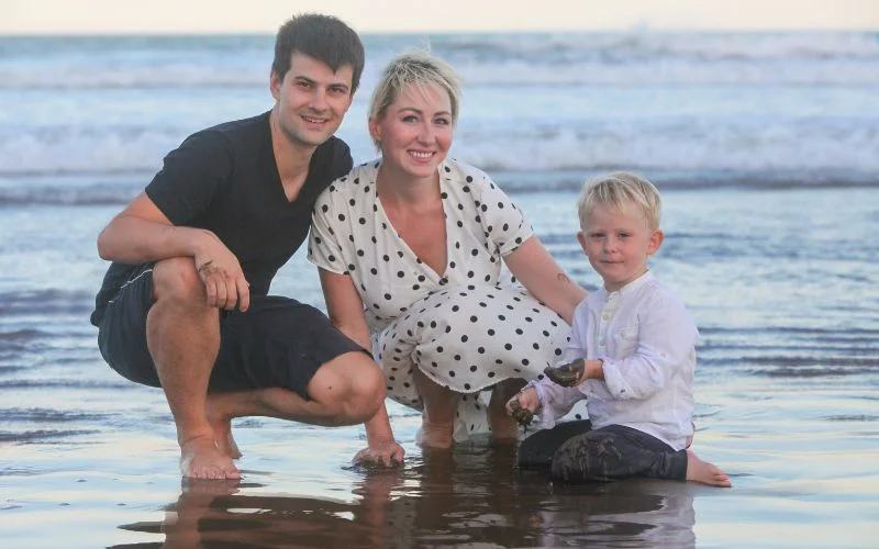 family pose at a beach, beach family photoshoot