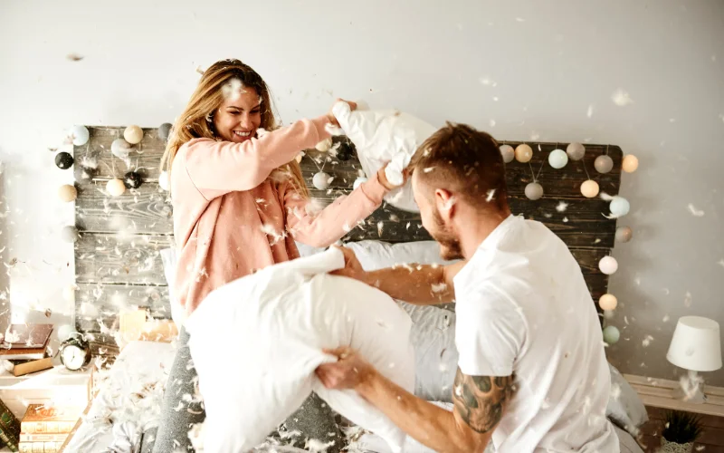 candid portraits - pillow fight