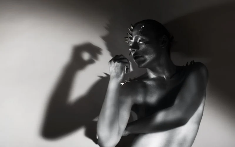 male boudoir poses with shine