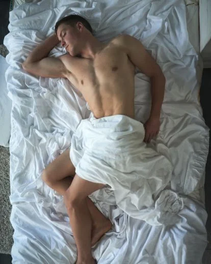 use of sheets in men boudoir poses