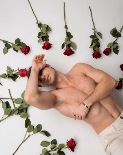 man boudoir poses with props