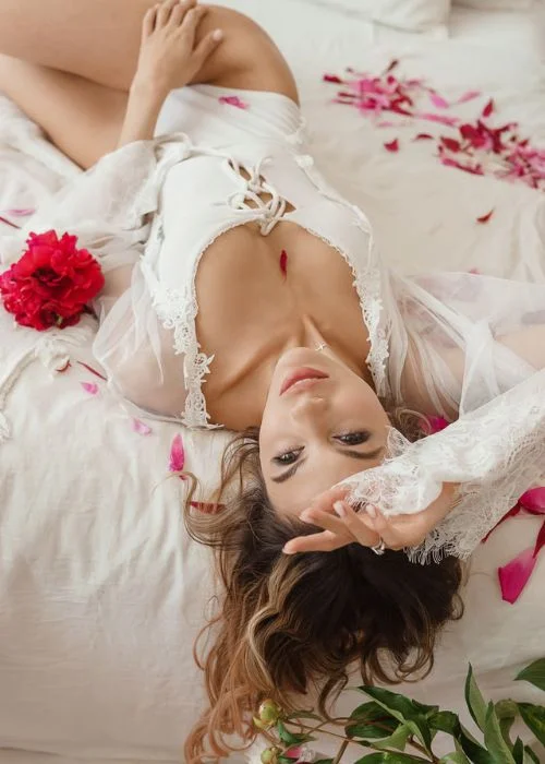 woman posing in lingerie, sensual Valentine's Day photos, love-themed boudoir session