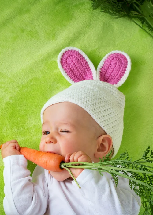 baby eating carrot