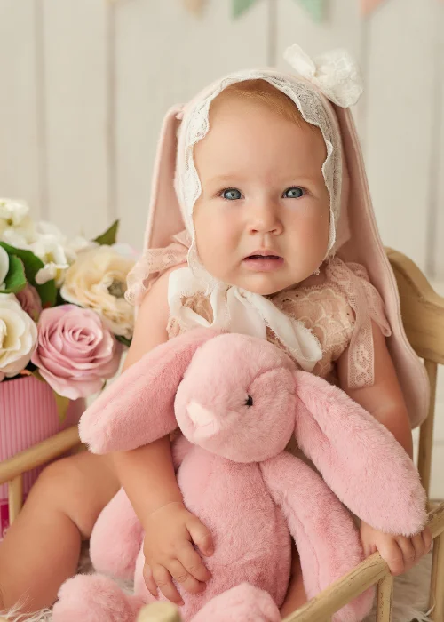 baby snuggling a stuffed bunny, newborn Easter outfit photos, spring newborn photography, Easter baby portrait ideas