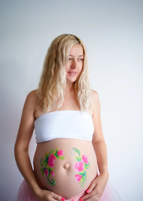 easter photo ideas for maternity shoot, Easter-themed maternity photos, Easter bump photoshoot, Easter baby bump pictures, Easter pregnancy announcement