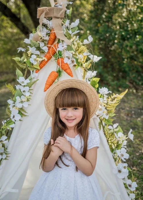girl posing in a tepee