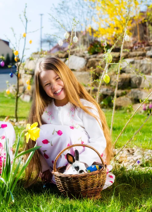 girl posing with a rabbit