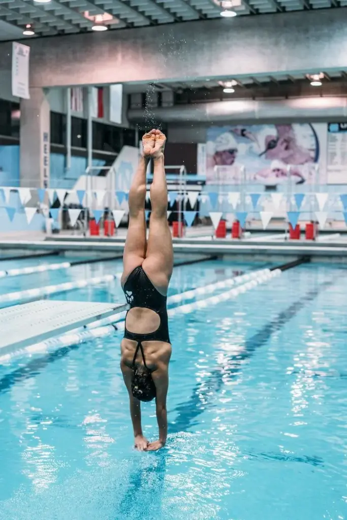woman diving into water