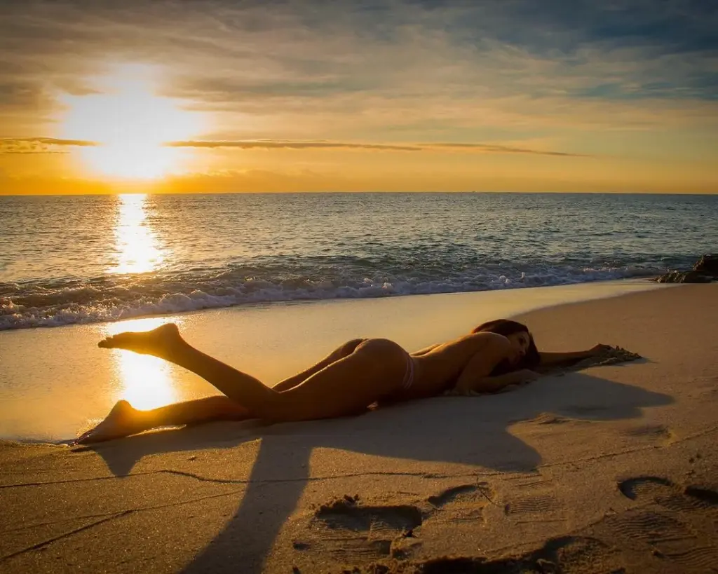 Nude boudoir sunset photo