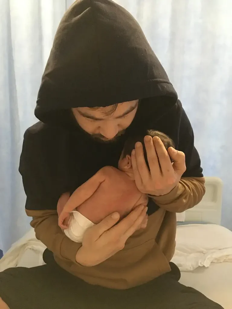 Gim Liu and his baby