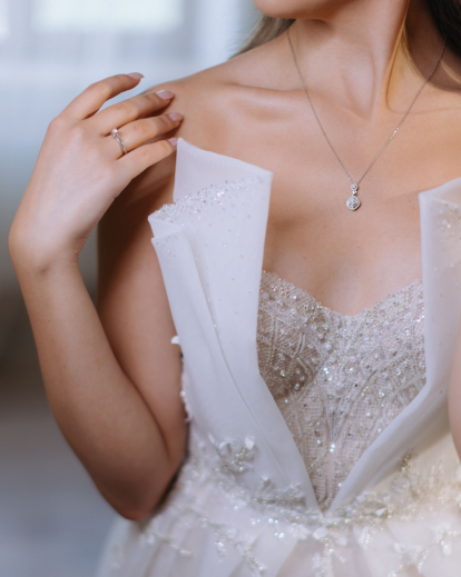 woman ripping her wedding dress off