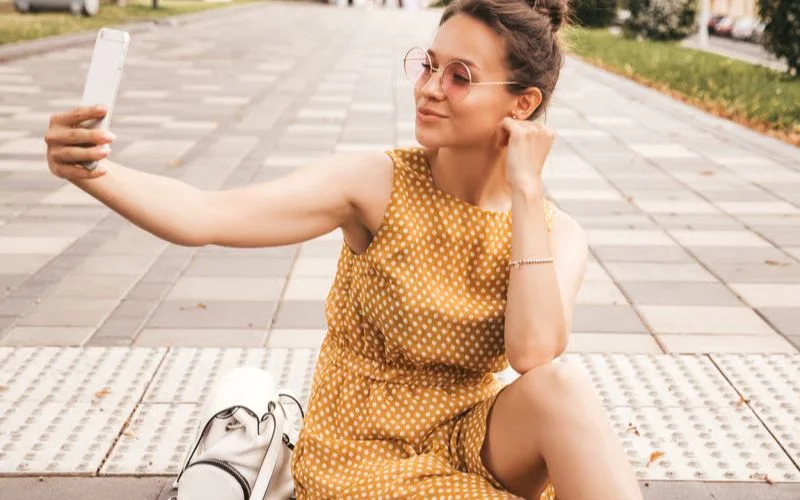 sitting on the curb instagram poses