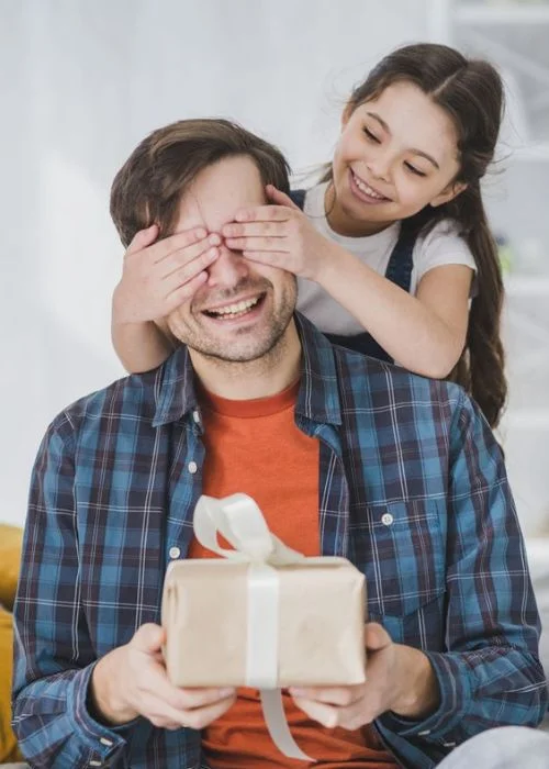 fathers day photo shoot while opening gift
