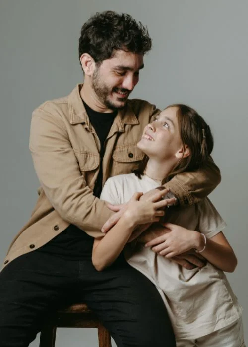 studio portraits of father and child
