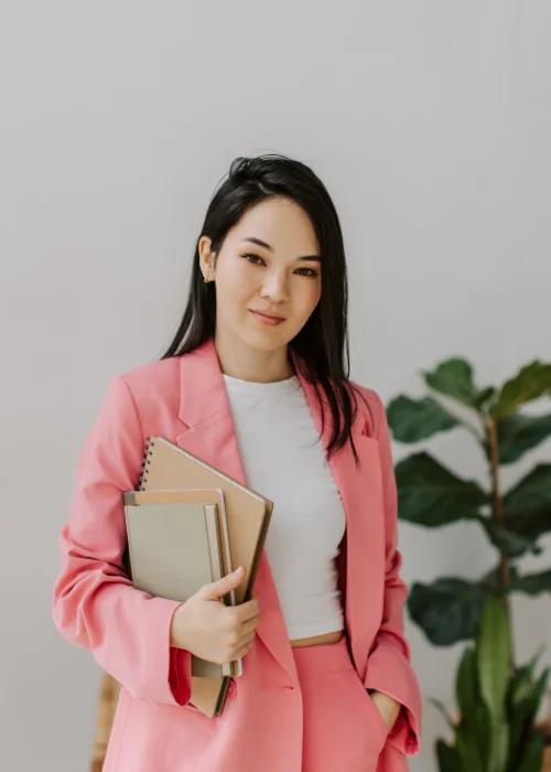 a woman with a book in her hand