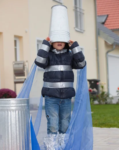 a kid with bucket