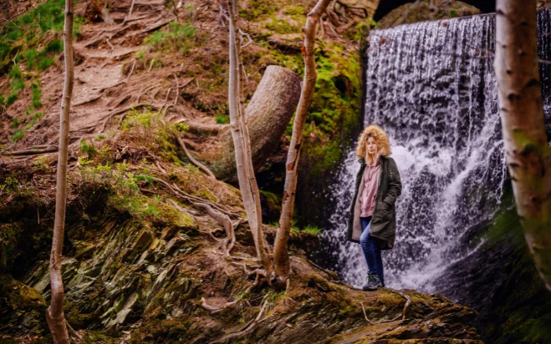hiking portraits in front of waterfall