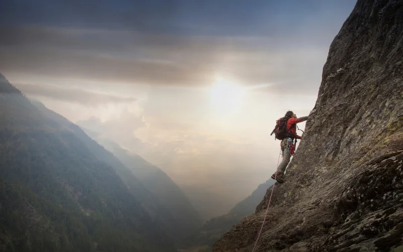 snap picture while rock climbing
