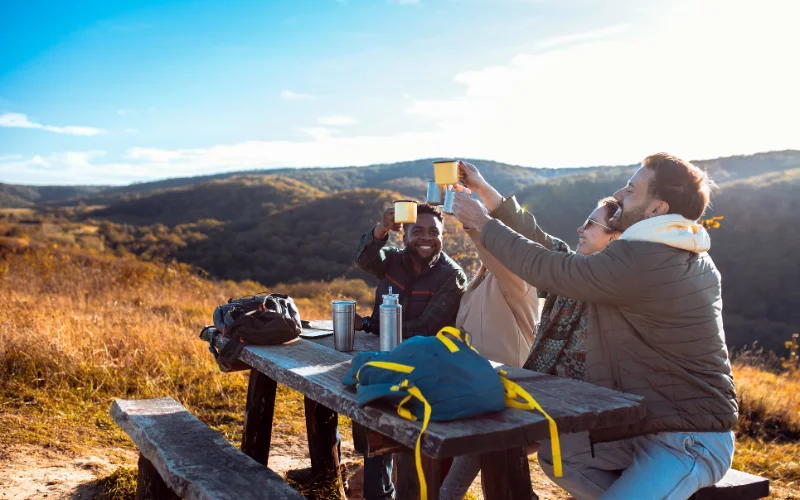 hiking poses while having a drink
