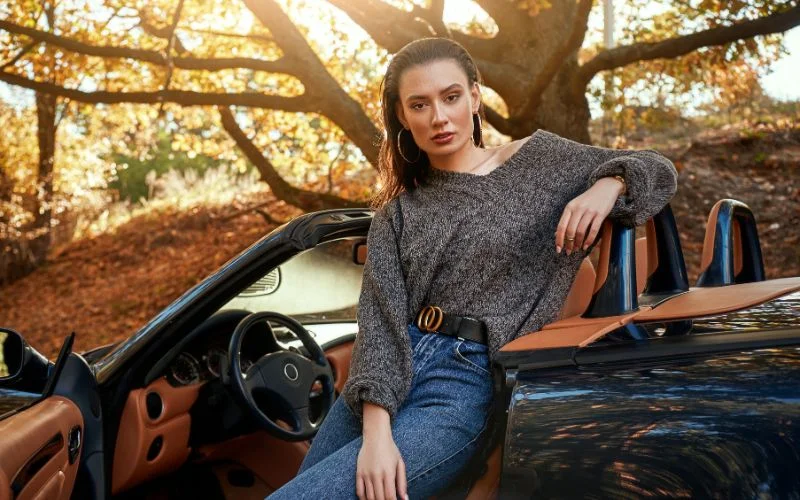 a model posing with the door - car photography poses