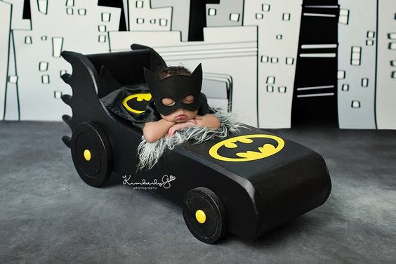 newborn dressed as bat-man for phot